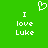 Green background with white pixelated text 'I love Luke' on both sides and a heart symbol above center.