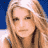 Static pixelated image of a person with long light brown hair against blue background, likely celebrity reference.