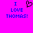 A bright pink background displays blue pixelated text reading "I LOVE THOMAS!" with a black pixelated heart symbol replacing the word "LOVE" in the left