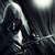 A dark, monochrome animated icon shows a hooded figure with long hair and a white mask-like face, holding a thin branch or twig.