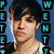 A pixelated image of a person with dark hair and light skin against a blue background, featuring text elements on the left and bottom.