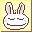 A contact sheet of 18 pixel art bunny head icons arranged in a 5x4 grid with one empty cell, each icon featuring distinct color variations and facial expressions on a yellow background.