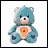 Blue Care Bear with pink inner ears and nose, seated on white background holding a heart-shaped symbol with orange and red details.