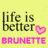 Yellow background with pixelated text 'life is better' in dark green and pink heart symbol, below which 'BRUNETTE' appears in bright pink block letters.
