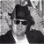 A pixelated grayscale image of a person wearing a dark hat and sunglasses, with green text reading 'Original Icons .com' on the right side.