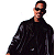 Pixelated image of a person in a black outfit with a high collar, wearing dark sunglasses, and a neutral expression against a white background.