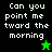 Pixelated text 'Can you point me tward the morning' on split black and green backgrounds with a star icon.