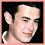 Three pixelated headshots of a person with dark hair in white-collared shirts against black backgrounds, arranged in a