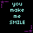 Pixelated cyan text "you make me SMILE" repeated in a pattern on black background with purple star and dot accents