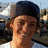 A pixelated image of a person wearing a dark cap and white shirt, with red text reading "Ryan<3" in the top-right corner.