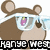 Pixelated cartoon mouse with brown ears and body, wearing white goggles with blue-tinted lenses showing a pink gem reflection, standing against plain background.