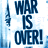 Pixelated blue text on white background reads 'WAR IS OVER!' with partial light blue vertical bar on left edge.