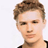 Static 48x48 pixel icon showing a close-up of a person's head and shoulders with brown hair, light skin tone, and black clothing visible at the bottom right corner.
