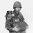 Pixelated grayscale image of a person in military attire holding a rifle, standing against a plain background.