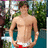 Pixelated image of a shirtless person in red shorts with text overlays on cyan background.