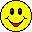 Two yellow pixelated smiley faces side-by-side; left face has straight eyes and a red mouth, right face has squinted eyes and a tongue sticking out.