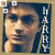 A pixelated image of a person with long dark hair and glasses, partially obscured by vertical text reading "HARRY" on the right side.