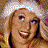 Animated contact sheet of a woman with blonde hair in five distinct poses and expressions, including Santa hat, bubblegum puffing, smiling, open-mouthed expression, and neutral pose, with "Coolbuddy.com" text on black background.