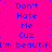 Bright pink background with blue pixelated text repeating 'Don't Hate Me Cuz I'm beautiful' in two , each containing the phrase twice