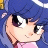 Pixelated anime-style character with blue hair and large eyes, next to black background with white text reading 'Anime IM' and 'com'.