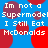 Blue background with red circular shapes and repeated white text reading "Im not a Supermodel I Still Eat McDonalds" in pixelated font.