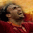 Pixelated static image of a person in red sports attire against warm-toned background with visible dithering and color blending.