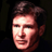 Static pixelated image of a person's face with dark hair and light skin tones against a black background, rendered in low-resolution 256x256 pixels.