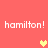 Red background with repeated white text 'hamilton!' and pixelated yellow/orange hearts in a static layout.