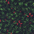 A pixelated static image with a dark green and black background scattered with small red and yellow pixel clusters.