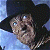A pixelated buddy icon featuring a character in a black cowboy hat on the left and green text reading "Original Icons .com" on a dark green background to the right.