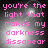 Pixelated text in pink reads "you're the light that makes my darkness disappear" over a dark background with bright white circular highlights.