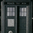 Two side-by-side show a dark blue police box with -patterned windows and silver accents, overlaid with pixelated text reading "T.A.R.D.I.S." above black bars containing white text