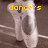Pixelated image of white ballet shoes on a brown floor with yellow text overlays reading 'dancers', 'kick', and 'butt!!!'
