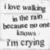 A static grayscale image displays pixelated text reading 'I love walking in the rain because it's cold. I'm crying.'