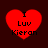 Four red heart-shaped icons with black text "I Luv Kieran" on a dark brown background, arranged in two of two