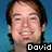 Pixelated portrait of a smiling person with brown hair against blue background, text "David" in white block letters on black rectangle at bottom right.