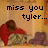 Pixelated image with text 'miss you tyler...' above a figure in red clothing holding another figure against a warm-toned background.