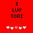 Red background with black text "I LUV TORI" and five white hearts, one pink heart in the center.