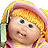 Pixelated static image of a cartoon-style doll with blonde hair and a green object near its face, rendered in low-resolution 256x256 pixels.