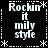 Black background with white pixelated text "Rockin it mily style" arranged in four quadrants, bordered by dotted lines and asterisks.