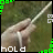 repeated hand holding a white string against grass background with green pixelated borders and text fragments