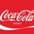 Red background with white cursive 'Coca-Cola' script and a wavy line below, rendered in pixelated style.