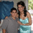 Two people stand close together in a pixelated photo; one wears gray, the other light blue. Pink text on red background reads "ME AND JULINA".