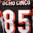 Black background with white and red text reading 'OCHO CIRCO' above large numbers '85', repeated in a pattern