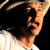 A 2x2 contact sheet of three animated frames showing a man in a cowboy hat and white shirt against a black background, with the bottom-right frame blank.