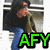 Pixelated image of a person with dark hair wearing a black shirt and blue pants, standing in front of a blurred background with green text 'AFY' at the bottom.