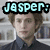 A pixelated image of a person with curly brown hair in a dark shirt, with text overlays reading "Jasper:", "the walking", and "chill pill!!" across different sections.