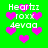 Green background with pink heart shapes and white text reading 'Heartz roxx 4eva' repeated across the image.