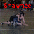 Two wrestlers in black singlets grapple on a mat with red text reading "Shawnee Wrestling" and "07-08" above them.