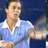 Static 48x48 pixel icon of a person in a light blue polo shirt with white collar against dark blue background, rendered at low resolution with visible pixelation and dithering effects.